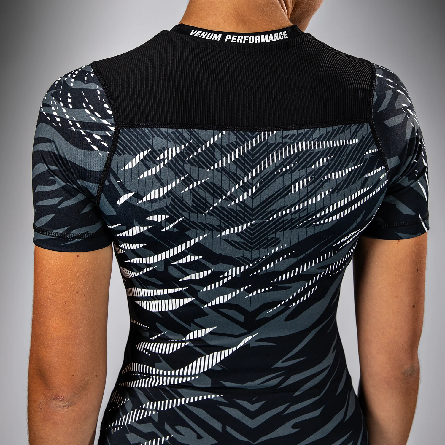 UFC Fusion by Venum Authentic Fight Night Women’s Performance Short Sleeve Rashguard - Black - Image 7