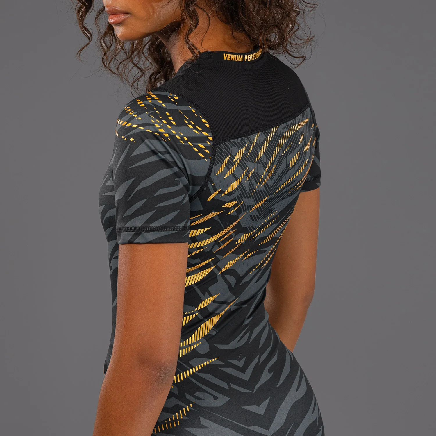 UFC Fusion by Venum Authentic Fight Night Women’s Performance Short Sleeve Rashguard - Champion - Image 6