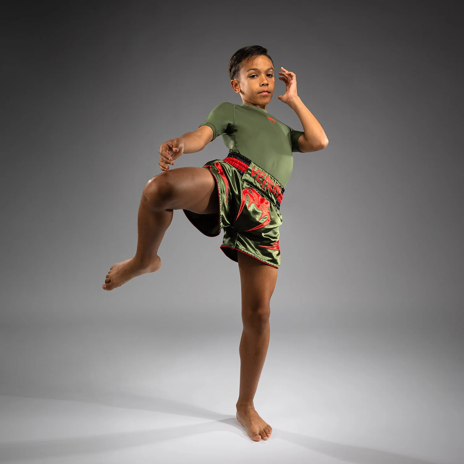 Venum Inferno Kids Muay Thai Shorts - Army Green/Orange - Image 3