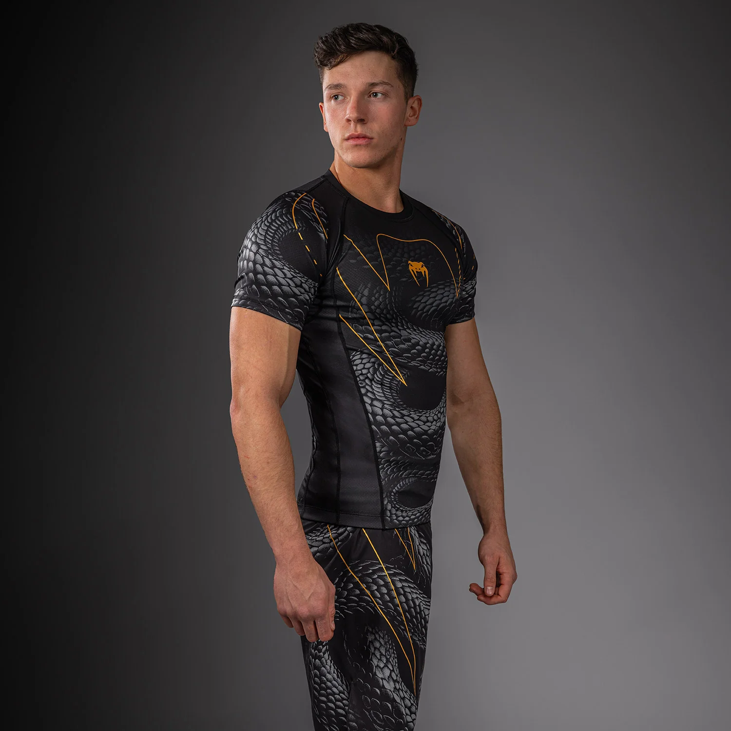 Venum Matupa Short Sleeve Rashguard - Black/Grey/Gold - Image 2