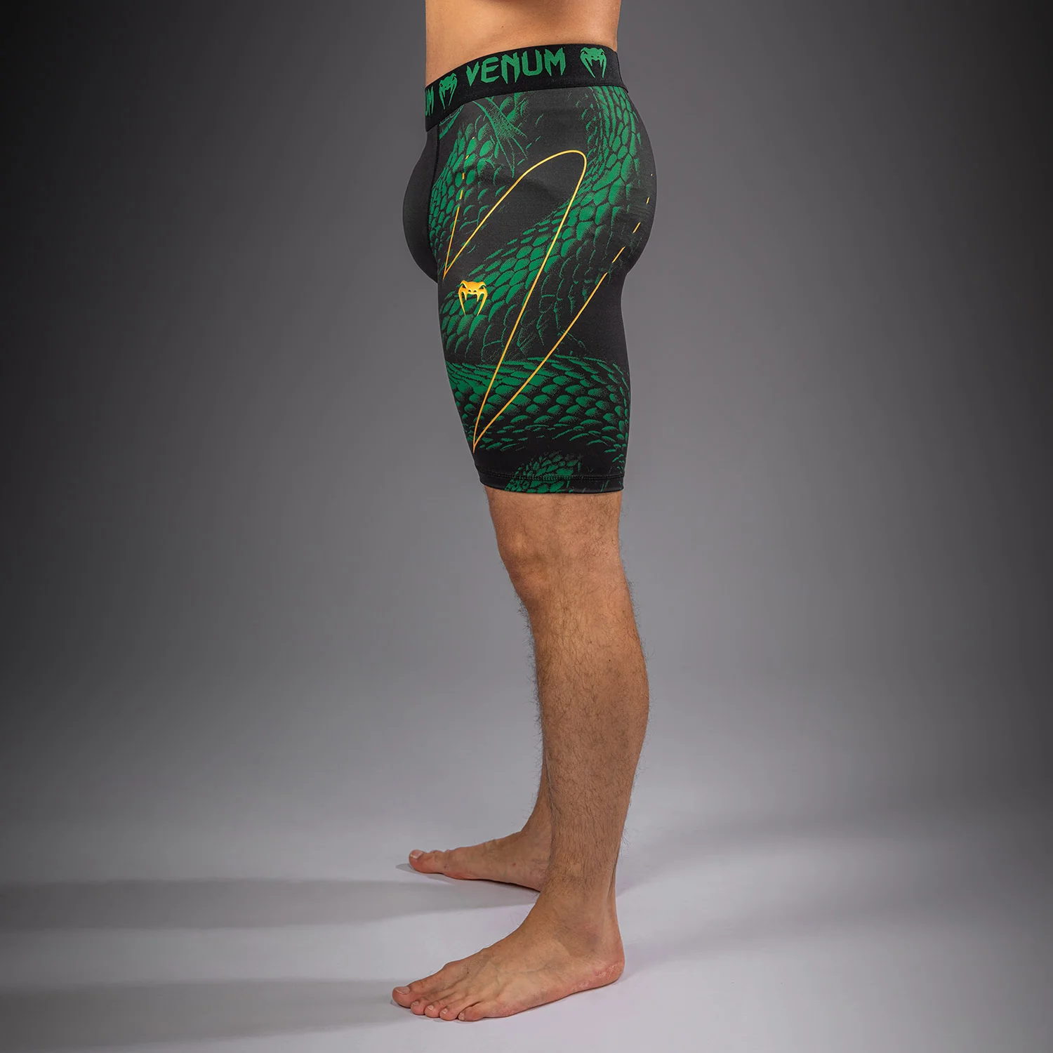 Venum Matupa Vale Tudo Shorts - Black/Green/Gold - Image 2