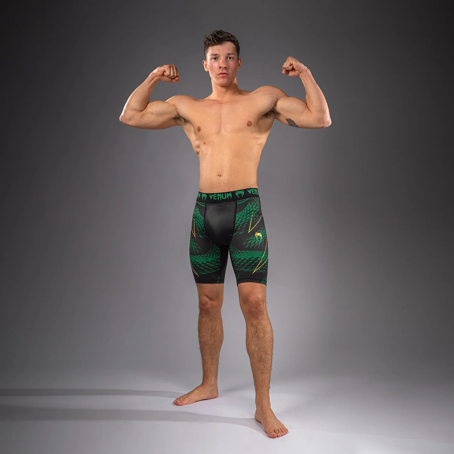 Venum Matupa Vale Tudo Shorts - Black/Green/Gold - Image 5