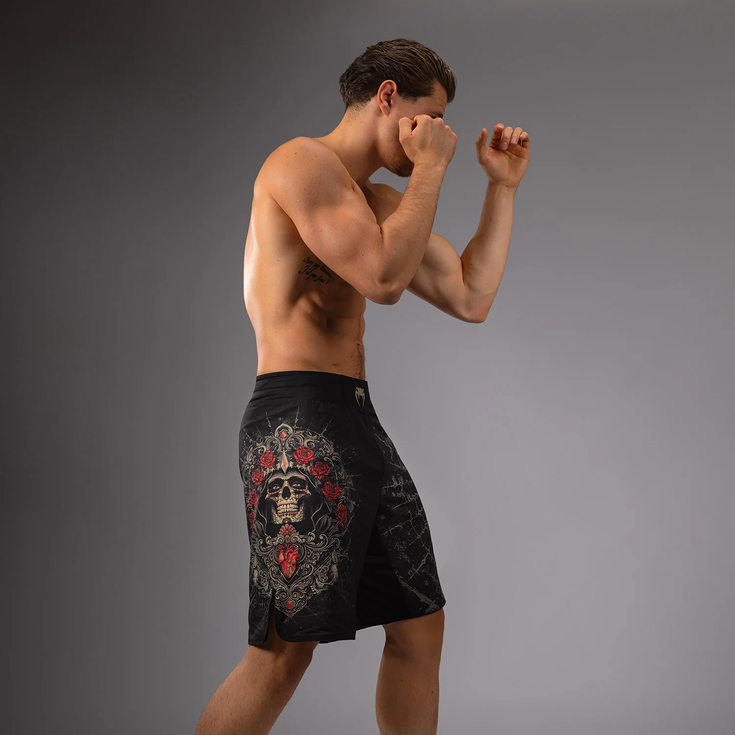 Venum Santa Muerte 5.0 Men’s Fight Shorts - Deep Black/Gold - Image 4