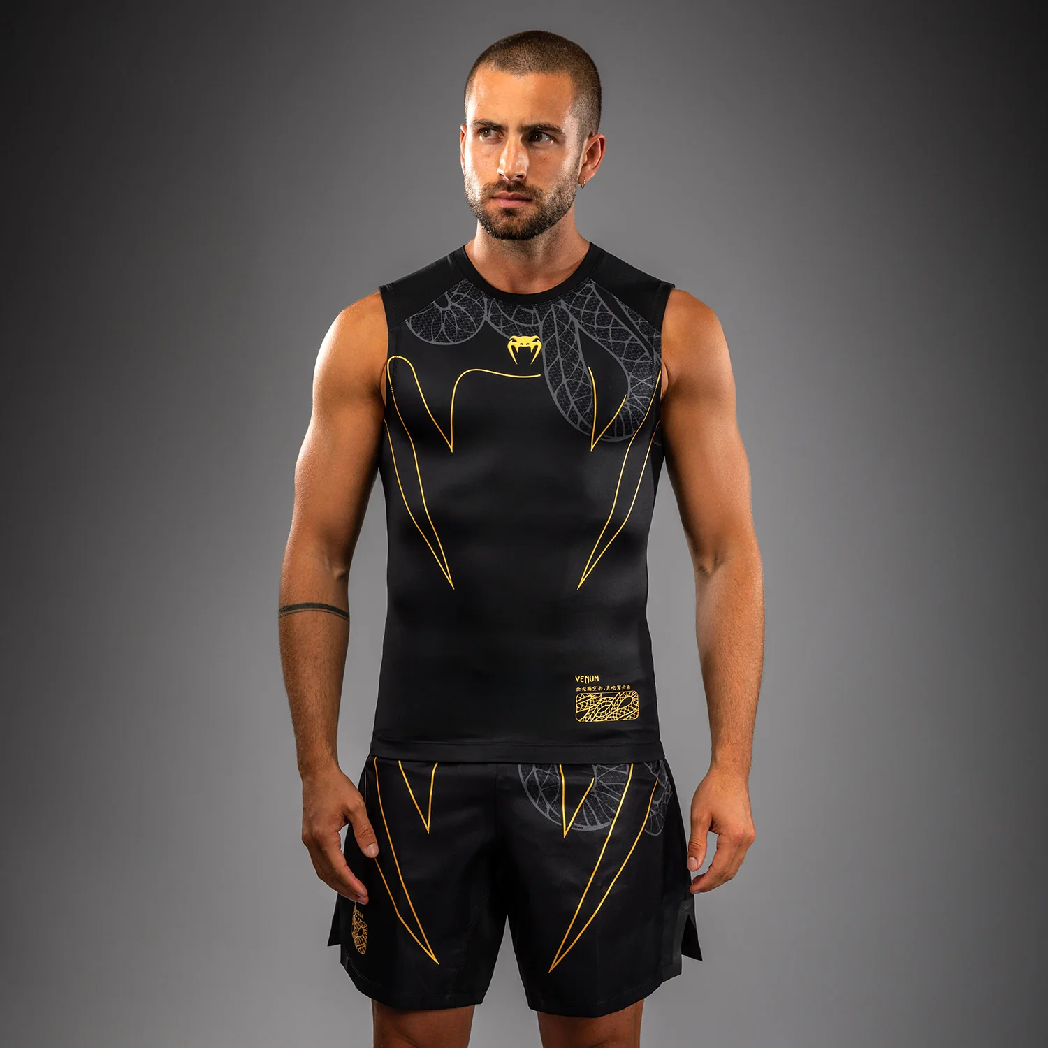 Venum Serpenti Sleeveless Rashguard - Black/Silver/Gold - Image 2