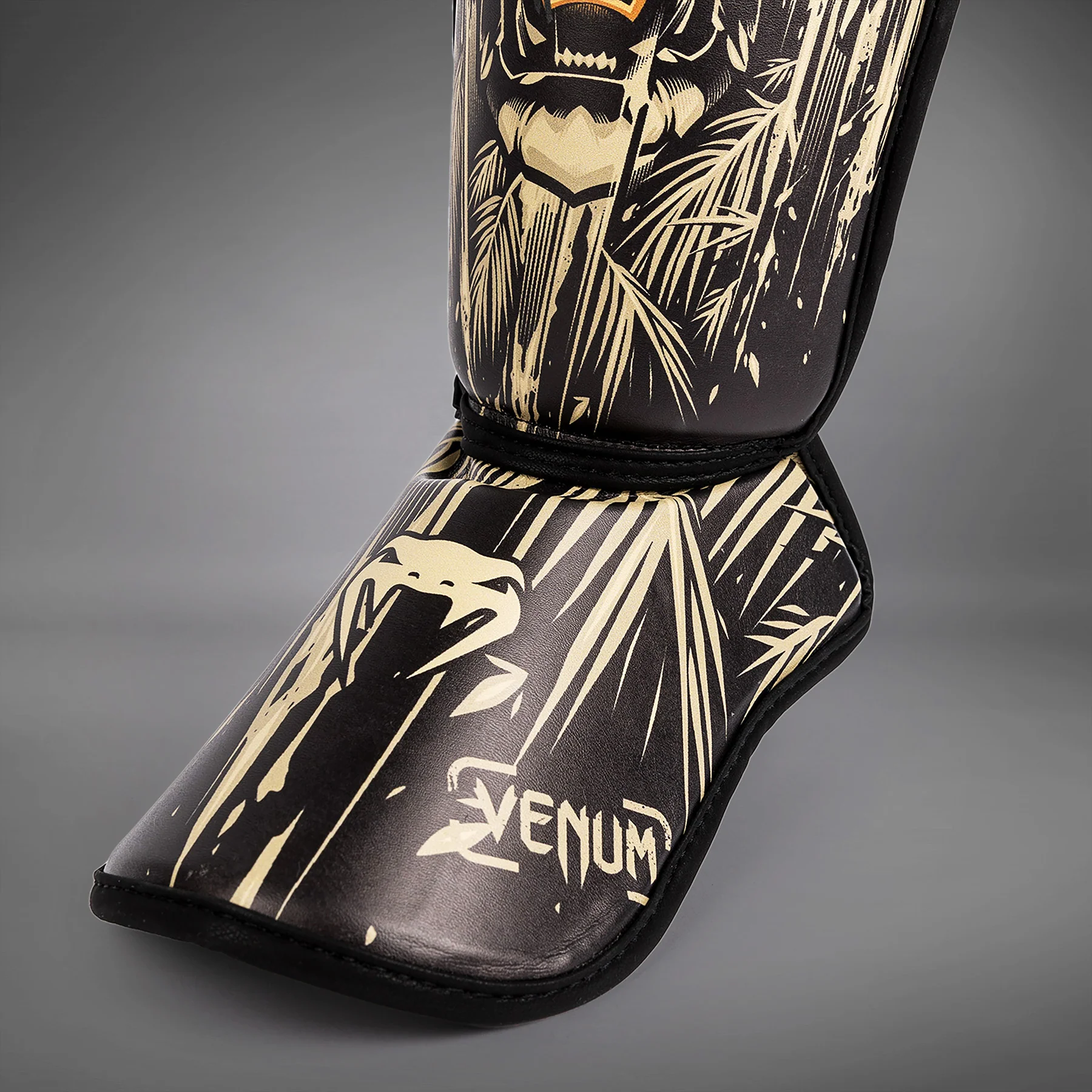 Venum Tiger Kids Shin Guards - Black/Neon Orang - Image 4